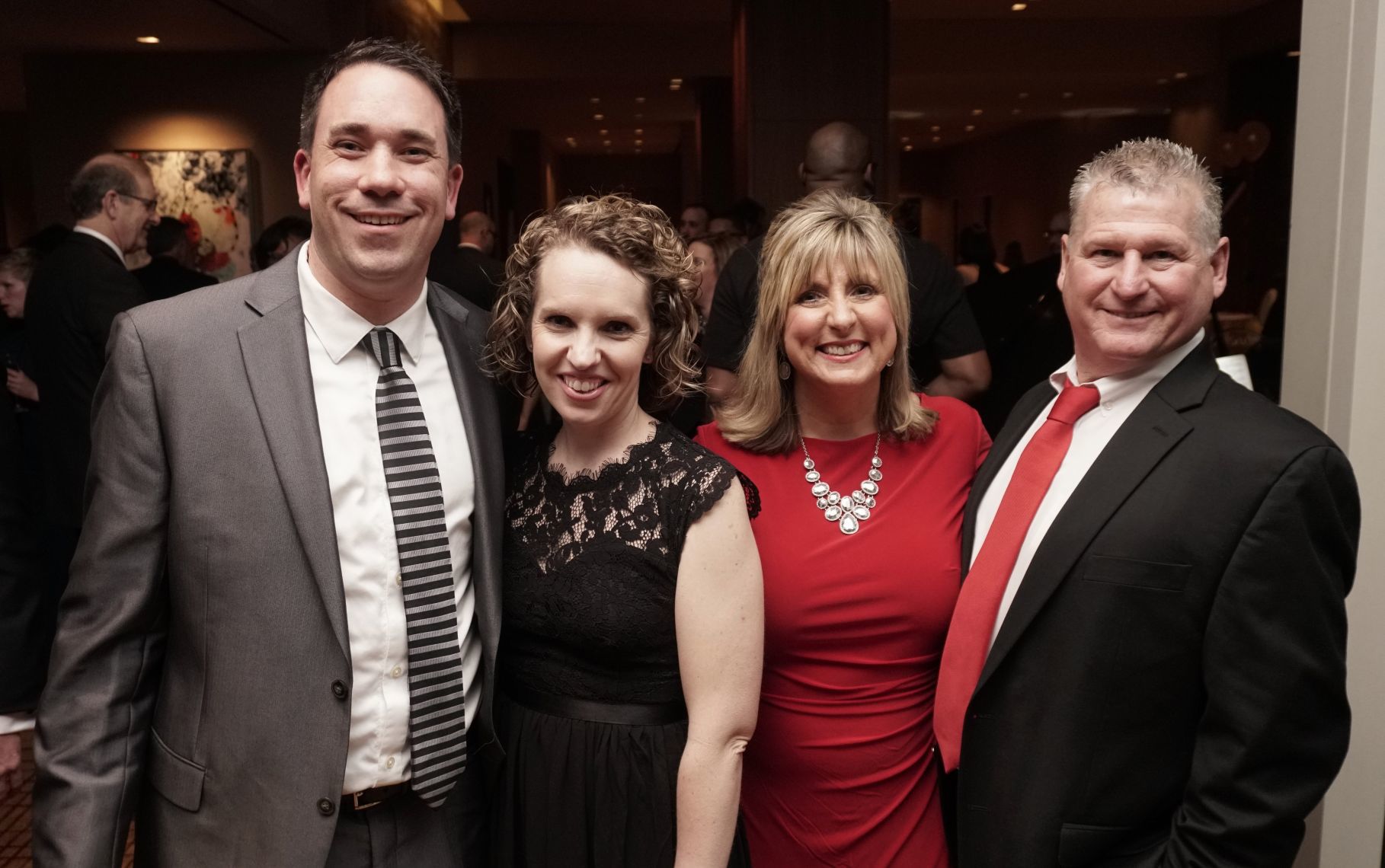 Trevor and Megan Egan, Kathy and Bruce Uzunoff